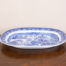 Large antique blue and white transfer ware platter. 19th Century meat platter in the 'Willow Pattern' Several chips to the glaze.