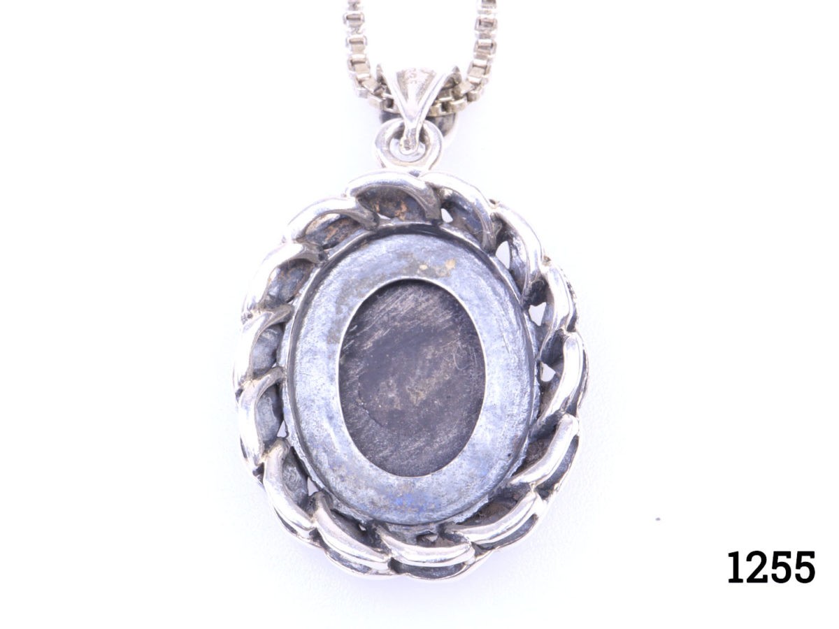 Vintage sterling silver box chain necklace with a sterling silver and black onyx pendant. Pendant drop length approximately 35mmand width 22mm Close up photo of back if pendant with 925 hallmark just visible at the top of the pendant bail