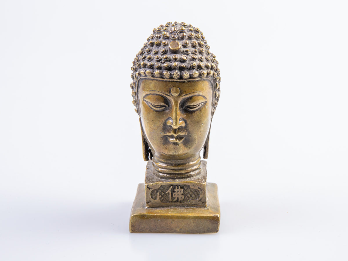 Vintage small brass Buddha head seal. Compact desk seal in solid brass with Chinese characters to the 4 sides below the head reading "The Light of Buddha Enlightens Broadly" Measures 42mm square at base and 50mm at widest point Main photo showing Buddha head straight face on