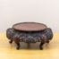 Rare large Japanese rosewood stand. Intricately hand-carved from one piece of rosewood, this is a rare large sized stand in excellent condition. Measures 198mm at top and 270mm in diameter at base