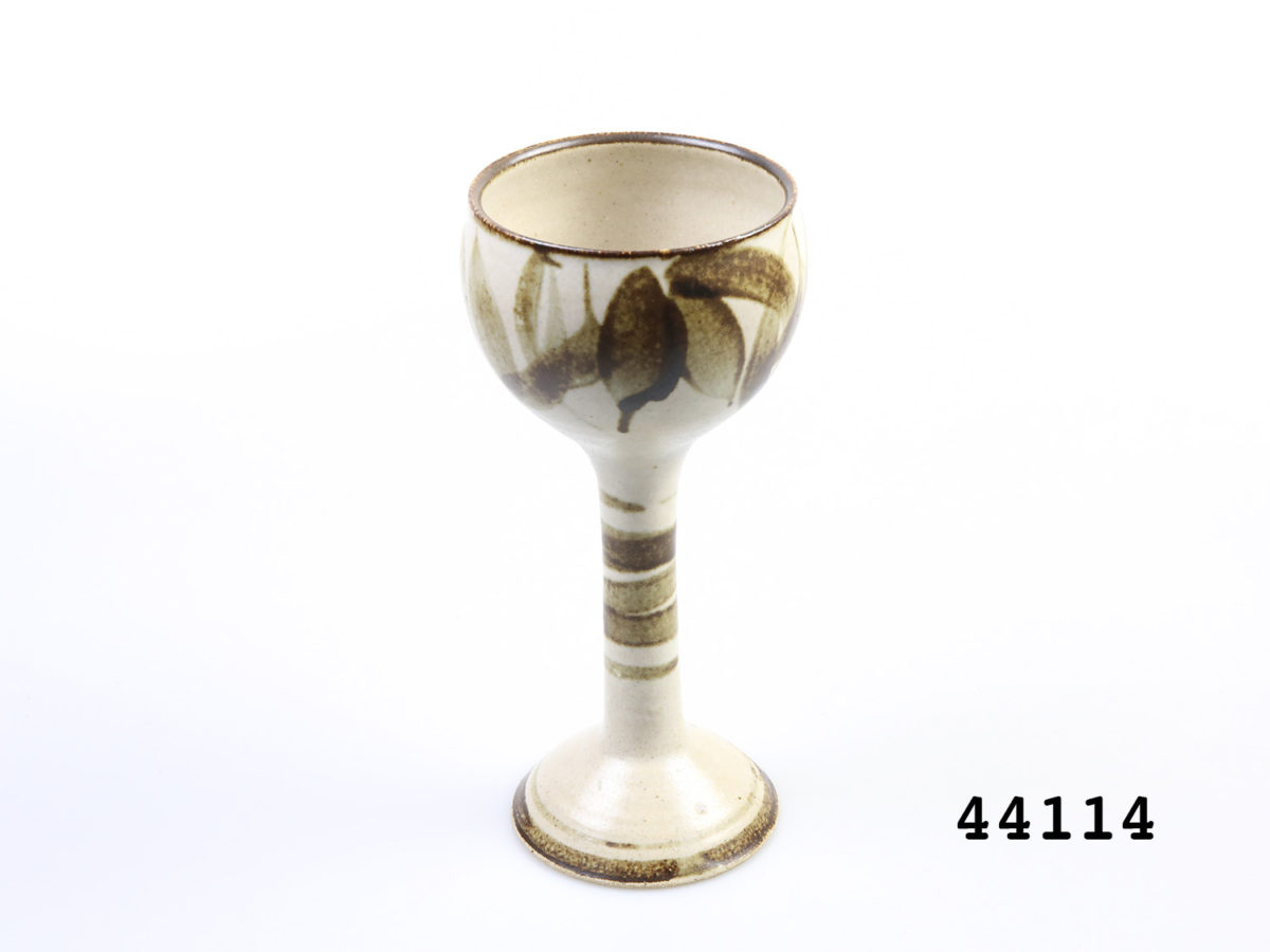 c1960s vintage German Studio Pottery goblets. Pair of tall goblets in earthy colours and design. Each goblet measures approximately 88mm in diameter at base and 95mm in diameter across the mouth. Another photo of one goblet from a slight raised angle