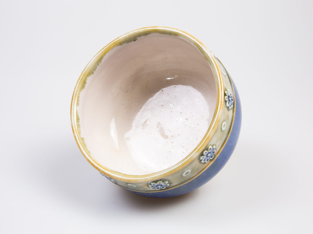 c1923 to 1927 small Royal Doulton bowl. Pretty bowl in iconic Doulton colours. Marked 8200 and accredited to artist Louisa Ayling. Measures approximately 85mm in diameter at base and 110mm across the top. Photo of bowl laid on its side to show bowl interior