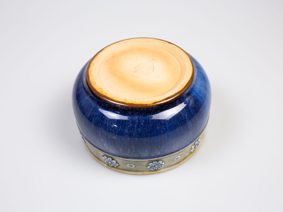 c1923 to 1927 small Royal Doulton bowl. Pretty bowl in iconic Doulton colours. Marked 8200 and accredited to artist Louisa Ayling. Measures approximately 85mm in diameter at base and 110mm across the top. Photo of base of bowl