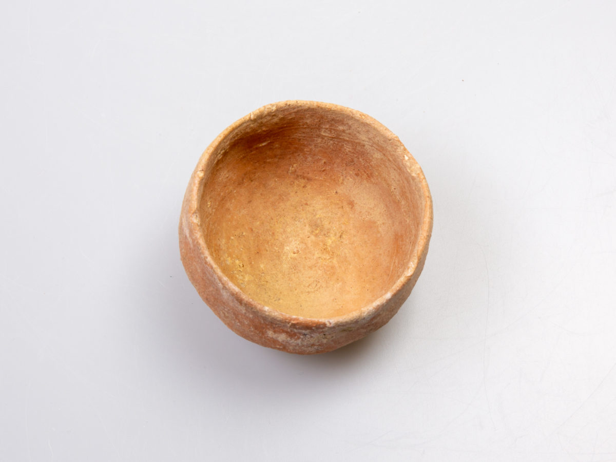 Bronze age terracotta votive cup. Circa 800-600 BC. Also known as a nipple cup. In superb condition. Measures approximately 66mm in diameter across the mouth. Photo of inside of cup