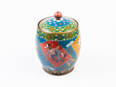 Early 20th century lidded cloisonne jar. Good sized jar in unusually muted colours for cloisonne which adds to the attractiveness of the jar. Decorated with flora and fauna to the side. Enamel in excellent condition. Finial is a little loose on the lid & needs attention. Measures 88mm in diameter at base, approximately 120mm in diameter at widest part and 165mm tall with lid. Main photo of jar shown with bird (pigeon?) side visible