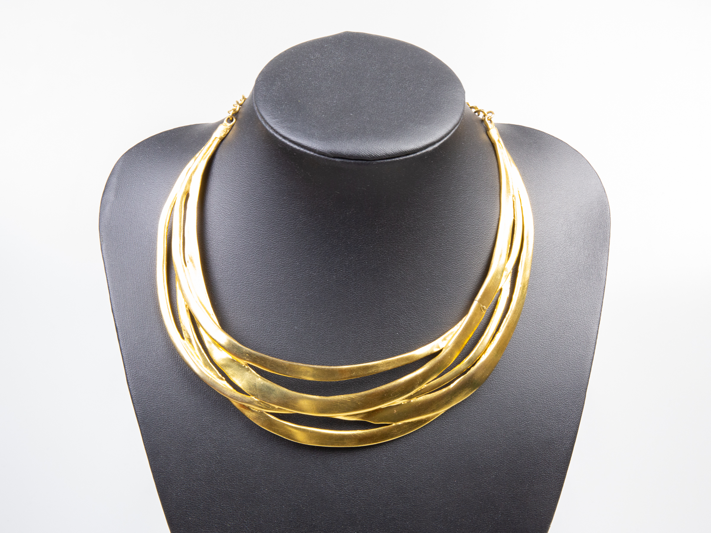 Vintage Kenneth Jay Lane collar necklace. Stunning gilt cut out collar necklace from the Safari range. Signed Kenneth Lane to the back. Slightly adjustable to maximum of 340mm Main photo of necklace displayed on a dark display stand