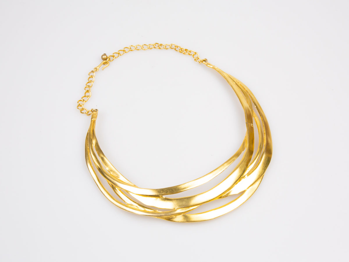 Vintage Kenneth Jay Lane collar necklace. Stunning gilt cut out collar necklace from the Safari range. Signed Kenneth Lane to the back. Slightly adjustable to maximum of 340mm Photo of necklace on a flat surface shown with the front facing up