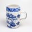 Antique Chinese blue and white tall mug. Rare mug from the Qianlong Li era c1736-1795. Decorated in classic willow pattern with an intricate and unusual 2 pleat handle. Small chip of the paint on the outer pleat handle and what appears to be a crack but most likely a consequence of the manufacturing process on the top of the inner pleat handle.  Otherwise in excellent condition for its age. Measures 82mm in diameter at base, 72mm across the top and 130mm at widest. Main photo of the mug showing the water side with the junk boat and bridge. Also the intricate design work on the handle ends
