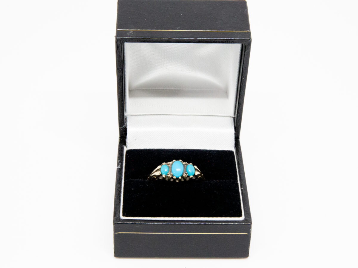 Vintage 9 karat gold and turquoise ring. Fully hallmarked 9 karat gold ring set with 3 sleeping beauty turquoise stones. Birmingham assay c1990. Ring size Q / 8.  Ring weight 2.4grams Photo of ring in a ring box (included)