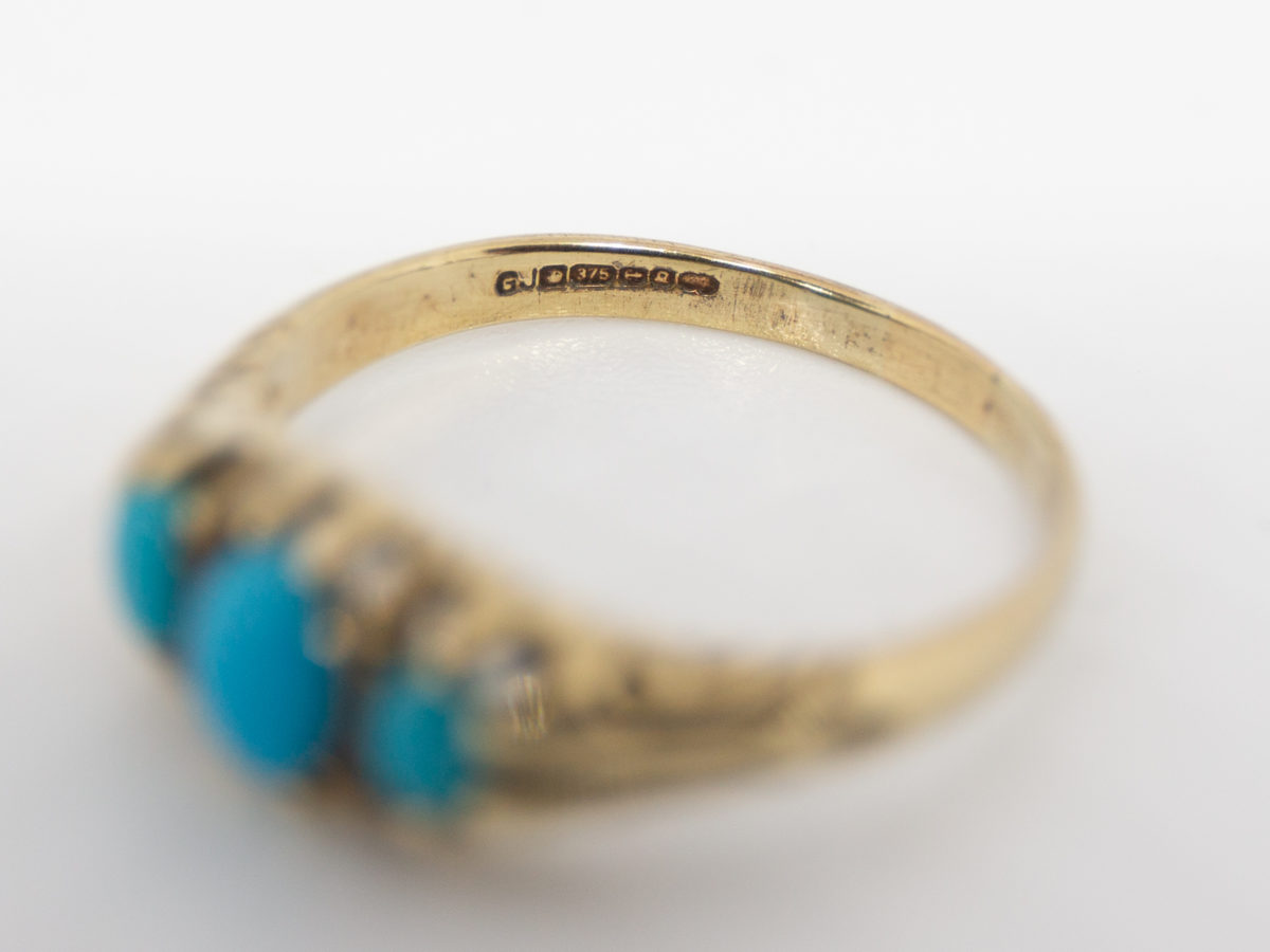 Vintage 9 karat gold and turquoise ring. Fully hallmarked 9 karat gold ring set with 3 sleeping beauty turquoise stones. Birmingham assay c1990. Ring size Q / 8.  Ring weight 2.4grams Close up photo of the hallmark on the inside band