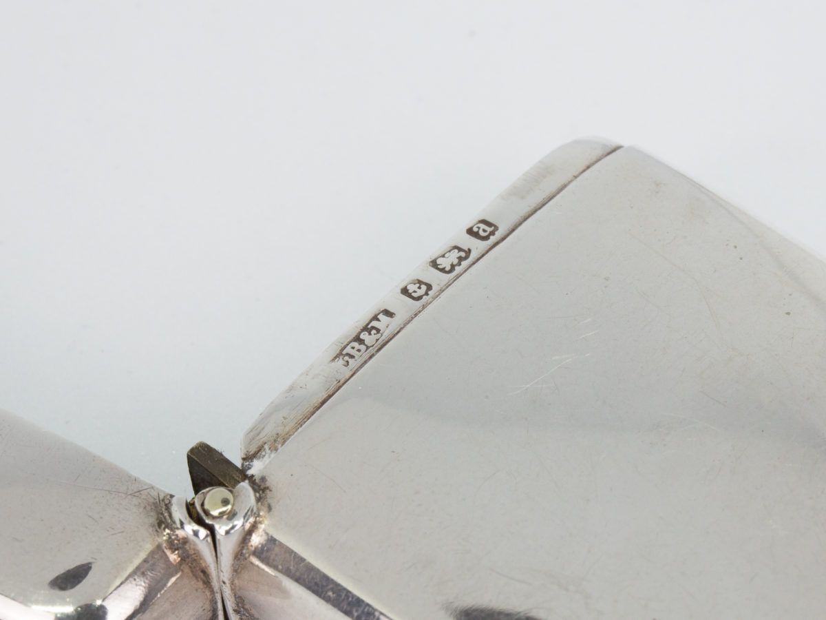 Sterling silver vesta with compass. Small silver vesta set with a small compass to one side. Fully hallmarked to the inside rim for Birmingham assay c1900 Close up photo of the hallmark on the inside rim of vesta