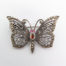 Vintage silver and marcasite butterfly brooch. Very pretty brooch with marcasite on wings and abdomen, red glass stone thorax and pink eyes. No visible hallmark. Main photo of brooch front shown right way up.