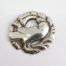 Vintage Georg Jensen dove brooch. Iconic early Georg Jensen dove brooch with No.165 stamped to the back. Made for import to London Bond St shop 1936-44. Main photo of brooch front.