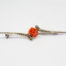 Art Deco silver and red coral rose brooch. Pretty Art Deco brooch in 800 grade silver. Carved red coral rose to the centre of silver and marcasite stylised Art Deco design. Simple elegant design typical of the Art Deco era. Will be mailed boxed. Main photo of brooch seen front facing.