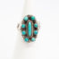 Vintage Navajo silver and turquoise ring. Sterling silver ring set with Bisbee blue turquoise. Stamped sterling with initials BB to the back for Benson Boyd. Wonderful example of fine Native American craftmanship. Ring size M / 6. Ring front measures 22mm by 15mm. Ring weight 4.3gms. Main photo of ring displayed on a cone shaped stand with ring front facing camera.