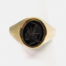 Vintage 9 karat gold and hematite ring. c1978 Birmingham assayed 9 karat gold ring set with a hematite intaglio showing profile of a Roman soldier. Ring size T.5 / 9.75 Main photo showing ring displayed on a cone stand and seen front facing from an eye level.