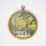 Hand-painted miniature with brass frame. Lovely hand-painted miniature of a man fishing by the river under the trees and a second person asleep. Wonderful detail to this piece of art. Measures 75mm in diameter. Drop length from top of bail measures 92mm. Main photo of picture laid on a flat surface with bail hook to the top of picture.