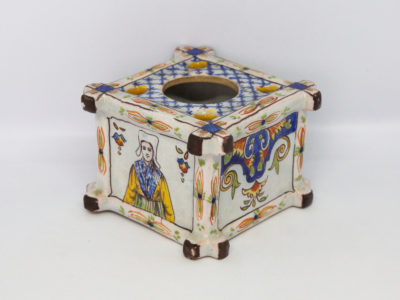 Late 19th century Faience inkwell. Antique inkwell attributed to Quimper and dated 1879 to the base. Beautifully hand painted in typical Quimper pottery colours with Brittany coat of arms and woman in traditional Breton costume. A couple of chips to the corners but otherwise in excellent condition for its age. Main photo of inkwell shown with one corner in the centre foreground with Breton lady side and colourfully painted side on show.