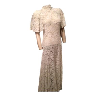 1972/3 BIBA long white lace dress with full cape sleeves. Perfect excellent condition with no rips or stains. Todays sizing fits 6 to 8. Main photo of dress showing full length and seen from the front. The dress is on a mannequin.