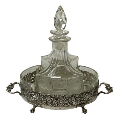 Antique Dutch filigree silver tray with fitted cut glass cruet set. Set consists of 2 bottles with stoppers for oil and vinegar and 2 open dishes with small sterling silver spoons for salt & pepper or mustard. Key hallmark to side of filigree tray c1853. Full hallmark for Birmingham assay to both spoons.  (The green hue on the bottles is caused by lighting used for photographing-the glass is all clear) Bottles are 145mm and 150mm tall with stoppers. Main photo showing the tray with all glass cruet pieces in place.