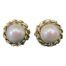 A vintage pair of large faux pearl earrings designed and made by Henkel & Grosse for Christian Dior. Main photo of earrings displayed side by side.