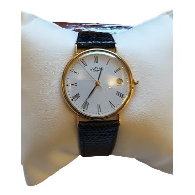 Gents Quartz Watch, Black Leather Rotary Strap, Original Boxes, Pre - Owned, Excellent Working Order, Gold Case Hallmarked Inside + Outside : 750 + 18kt. Main photo of watch displayed wrapped on the packing cushion.