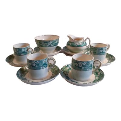 Meakin 30s coffee set. 4 small cups and saucers with Milk Jug and Sugar bowl (plus saucers). in good condition no chips. Main photo of whole set laid out in a circle each on top of a saucer.