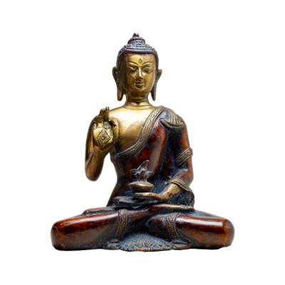 Vintage bronze Buddha. Decorated robes with Vitarka Hand Mudra. Main photo of Buddha from the front.