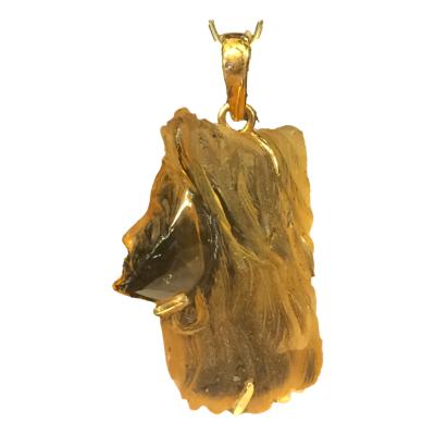 Intricately carved citrine face mounted in 18k gold. Hallmarked. Main photo of the pendant front showing the finely carved detail to the profile.