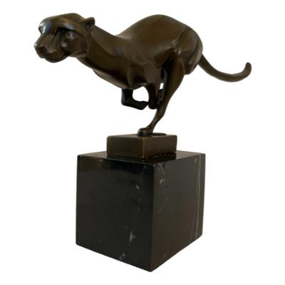 Art Deco style signed bronze of a cheetah. Beautifully made bronze mounted on marble showing cheetah in full speed mode. Signed Mila to the base.        Cheetah measures 315mm long. Marble base measures 85mm by 75mm. Highest at 195mm.  COLLECT FROM STORE ONLY. Main photo showing cheetah from a off front angle with cheetahs head to the front left and tail to the back of photo.