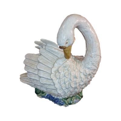 The large ceramic swan is a beautiful piece of decorative ware. Realistic in size and colouring with a very noble head. COLLECT FROM STORE ONLY. Main photo of swan seen from a slight side angle with tail end to the left and neck to the right of photo. The swan is preening its back feathers so head is almost to the centre.