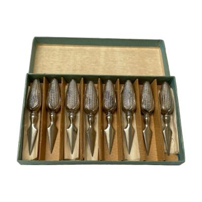 Set of 8 vintage American corn on the cob holders in the form of corn. Each holder is hallmarked sterling on both sides of corn husk and measures approximately 72mm in length. Comes in original box which has been written on to identify contents! There is some minor staining to a few of the pieces. Main photo of holders displayed inside the box.