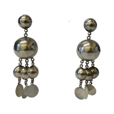 Pair of vintage sterling silver dangle earrings. Fun pair of earrings that evoke memories of disco days. Would look amazing paired with a sequinned number. A few minor dinks. Drop length 70mm. Ball at top measures 22mm wide in diameter. Main photo of both earrings shown hanging and front facing.