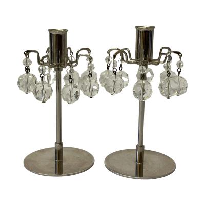 Pair of vintage J & L Lobmeyr crystal drop candlesticks. Elegant silver plated candlesticks with faceted Austrian crystal drops. Measures 70mm in diameter at base. Main photo of both candlesticks shown side by side and from an eye level
