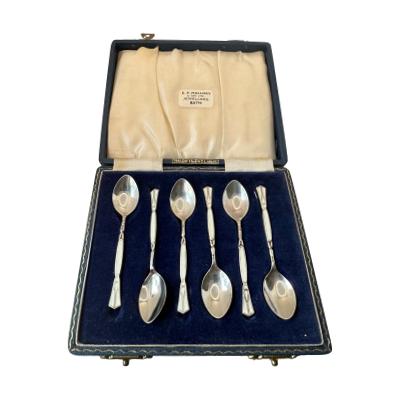 Vintage Henry Clifford Davis Birmingham silver and enamel boxed set of 6 coffee spoons hallmarked c1959. Beautiful enamel detail with a different flower design to back of each spoon. There is a slight blemish of the enamel to one spoon at the handle. Each spoon measures 80 x 0.5 x 15 mms. The measurements below are for the box. Main photo of all 6 spoons laid face up inside the fitted case.