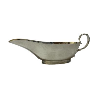 Small and sleek sterling silver sauce boat. Wonderfully stylish and aesthetically pleasing small sauce boat in sterling silver. Full hallmark to the side for Birmingham assay c1901. Some small dark spots. Main photo of sauce boat seen length ways and an eye level angle with spout to the left and handle to the right.