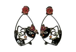 Modern vintage Taratata Cat Earrings. Fun pair of cat earrings by upcycling legends Taratata using metal forged into a cat shape and applied with enamel and embellished with other upcycled materials. In this instance the felt flowers applied with metal centres and small gilt metal balls for cats collar. Wonderful unique works of upcycled art! Drop length 57mm and width at widest 30mm. Main photo of both earrings shown side by side, Their composition gives them a look of a Mondrian like painting.