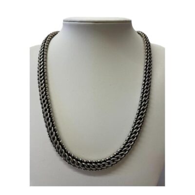 Heavy Mexican chain in sterling silver. Vintage chunky 925 sterling silver chain with a very intricate link pattern. Hallmarked 925 Mex to the clasp. Chain weighs 104gms. Main photo of necklace displayed on a stand and shown forward facing.