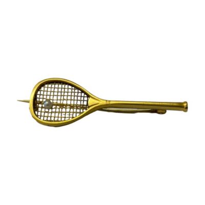 French tennis racket brooch in 18 karat gold. Antique French brooch in the form of a tennis racket with a seed pearl to the head as a ball c1880. There are 2 worn marks, one to the pin and other to the pin hook. The pin extends further than the racket. Weight 2gms. Main photo showing brooch laid sideways with the racket head to the left and handle to the right.