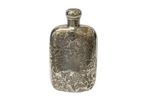 Antique flask in sterling silver. A substantial sterling silver flask covered in debossed foliage of various wild plants. There is a blank area to both sides of flask  for thumb and finger hold which can also be personalised. Fully hallmarked for Birmingham assay c1891. Main photo of flask shown from thumb hold side which is the empty cartouche slightly lower down.